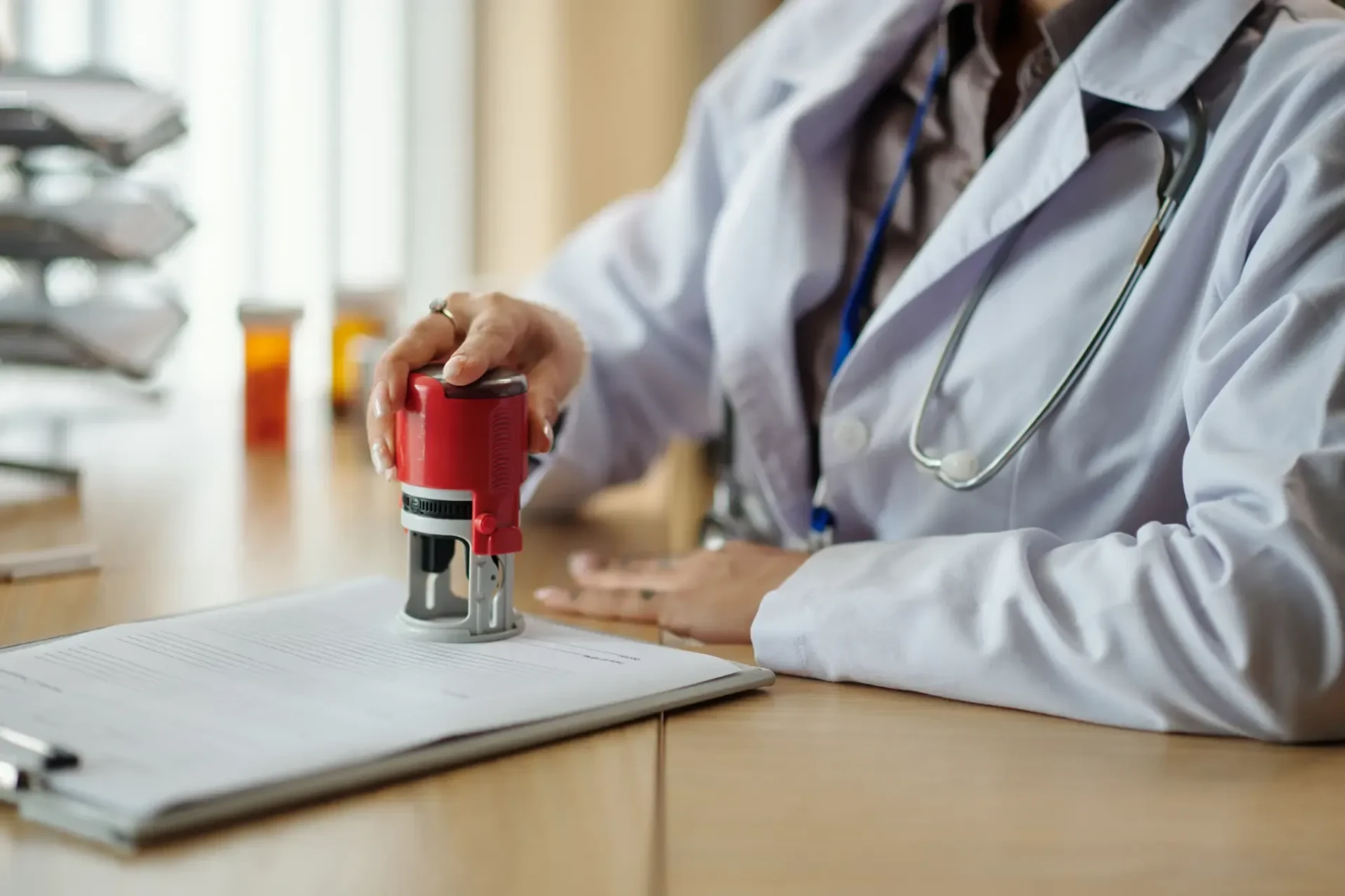 Healthcare administrator processing documents
