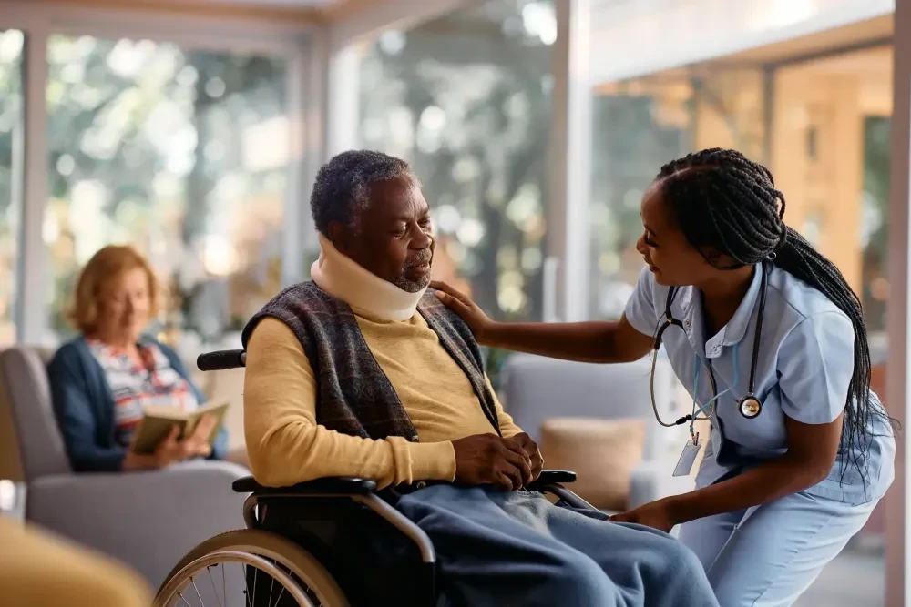 Healthcare professional speaking with a patient